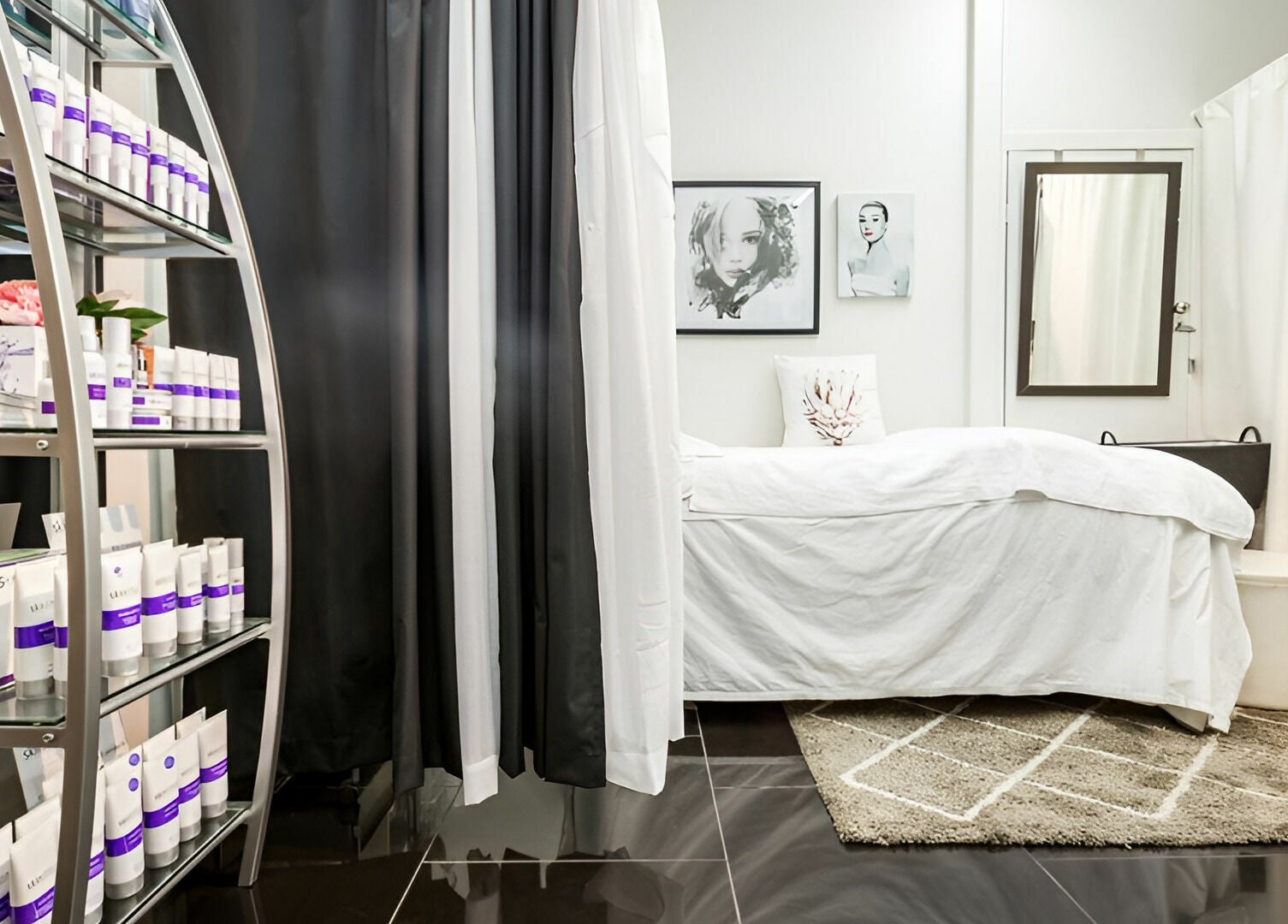 Serene treatment room at Precious Beautee, Ashfield, New South Wales, AU, featuring plush bedding and skincare products.