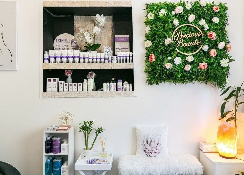 Cozy seating and product display at Precious Beautee in Ashfield, New South Wales, AU showcasing elegance and wellness.