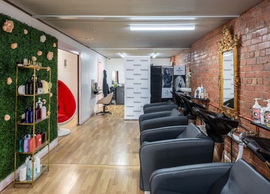 M.O.H & Co salon interior with modern design in Melbourne, Victoria, AU, showcasing hair care products.