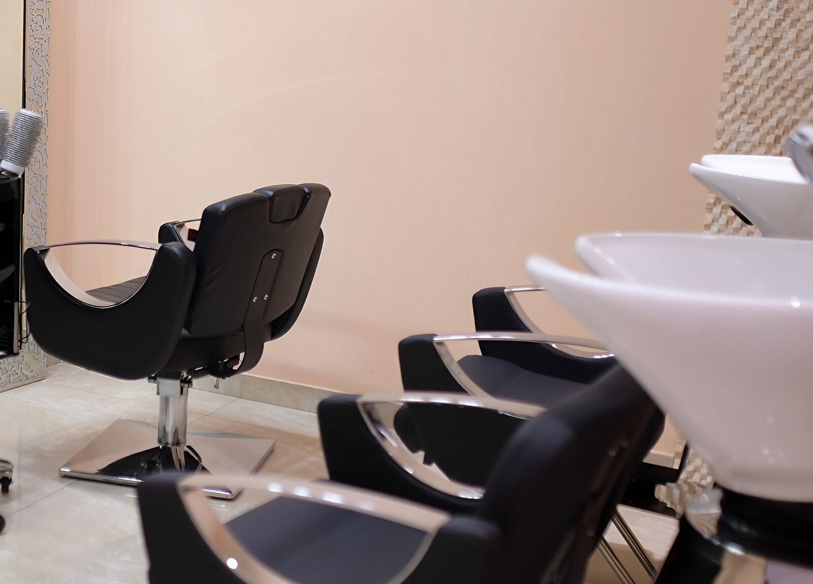 Sleek salon chairs and wash basins at Herbal Spa D.O.O. Podružnica 2, Centar, Sarajevo, Federacija Bosne i Hercegovine, BA.
