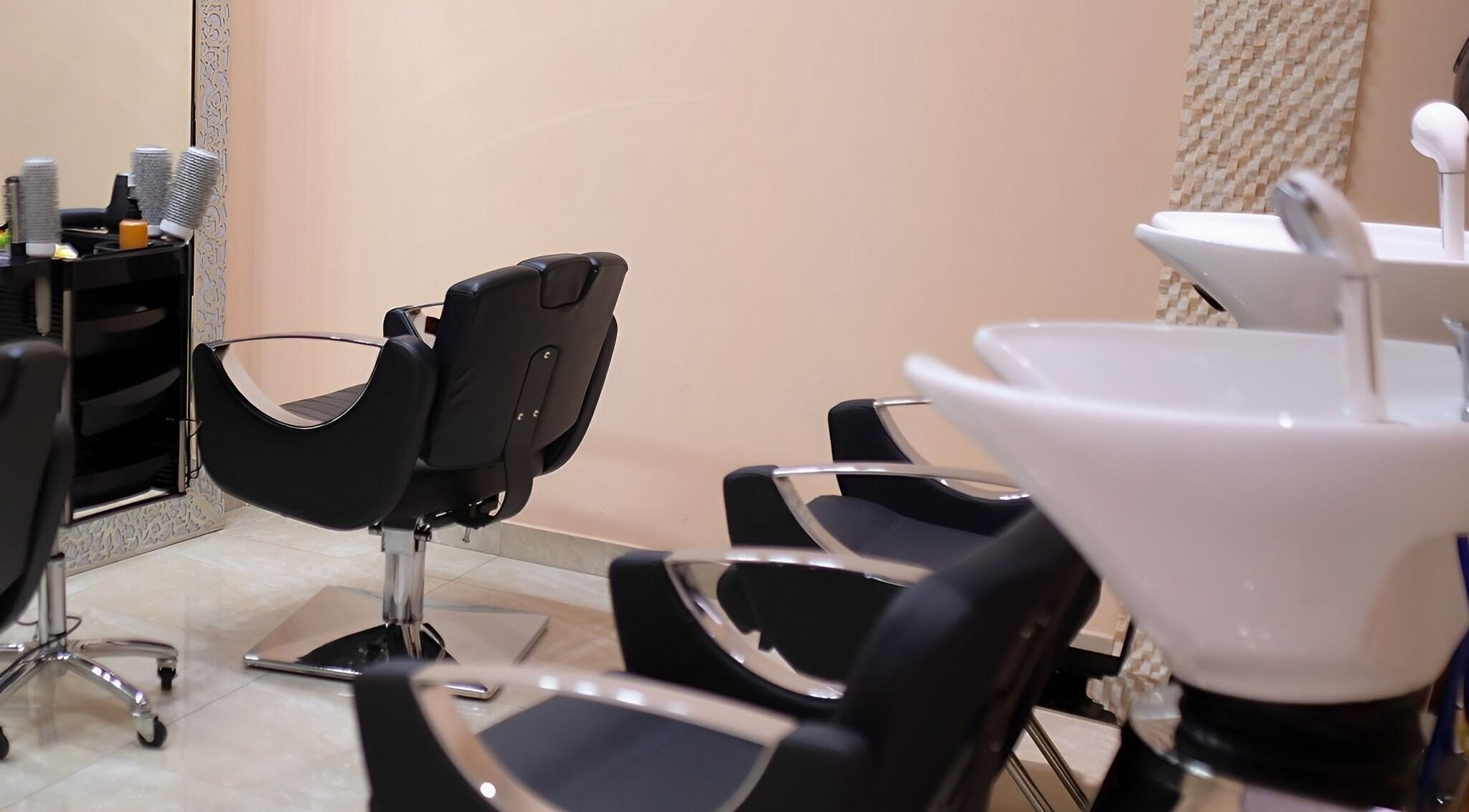 Sleek salon chairs and wash basins at Herbal Spa D.O.O. Podružnica 2, Centar, Sarajevo, Federacija Bosne i Hercegovine, BA.