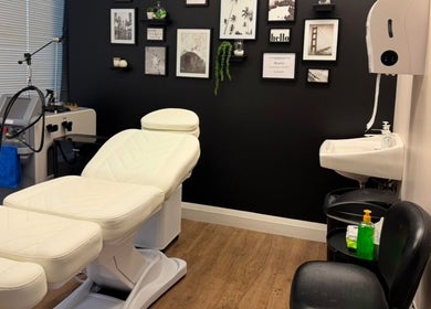 Modern treatment room at NU Med Clinic and MediSpa in Toronto, Ontario, CA with a sleek aesthetic setup.