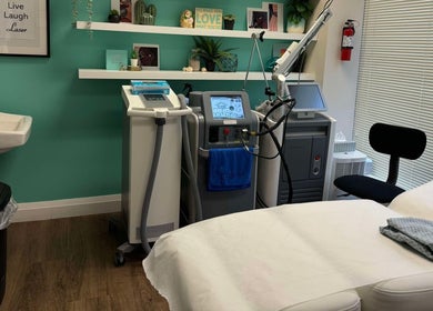 Modern and serene treatment room at NU Med Clinic and MediSpa, Toronto, Ontario, CA with advanced laser equipment.