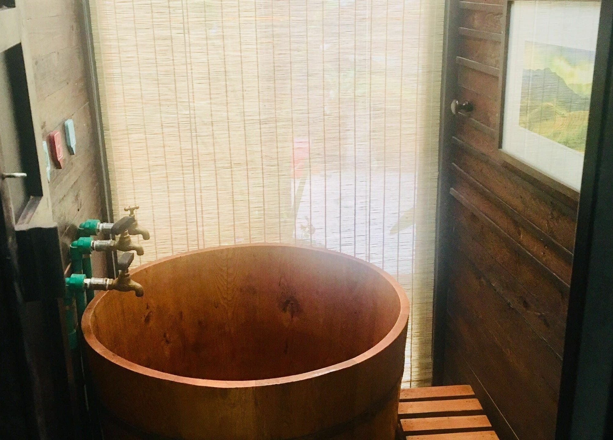 Rustic wood tub at Dao's Care Spa - Ba Đình in Hà Nội, Hà Nội, VN, offers a relaxing spa experience.