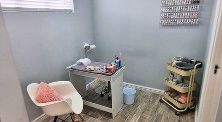 Minutiae Beauty nail care corner in Cape Town, Western Cape, ZA, featuring calm decor and organized polish display.