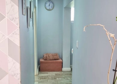 Relaxing hallway at Minutiae Beauty, Cape Town, Western Cape, ZA with soft decor and a calm ambiance.