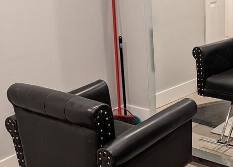 Modern salon chair at Shear Amazement and Luminous Spa Inc. in Kitchener, Ontario, CA. Sleek and inviting ambiance.