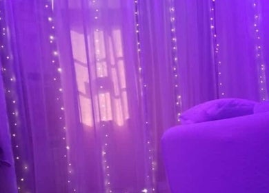 Serene purple-lit massage room at Misfit Massage Services, San Fernando, San Fernando City Corporation, TT.