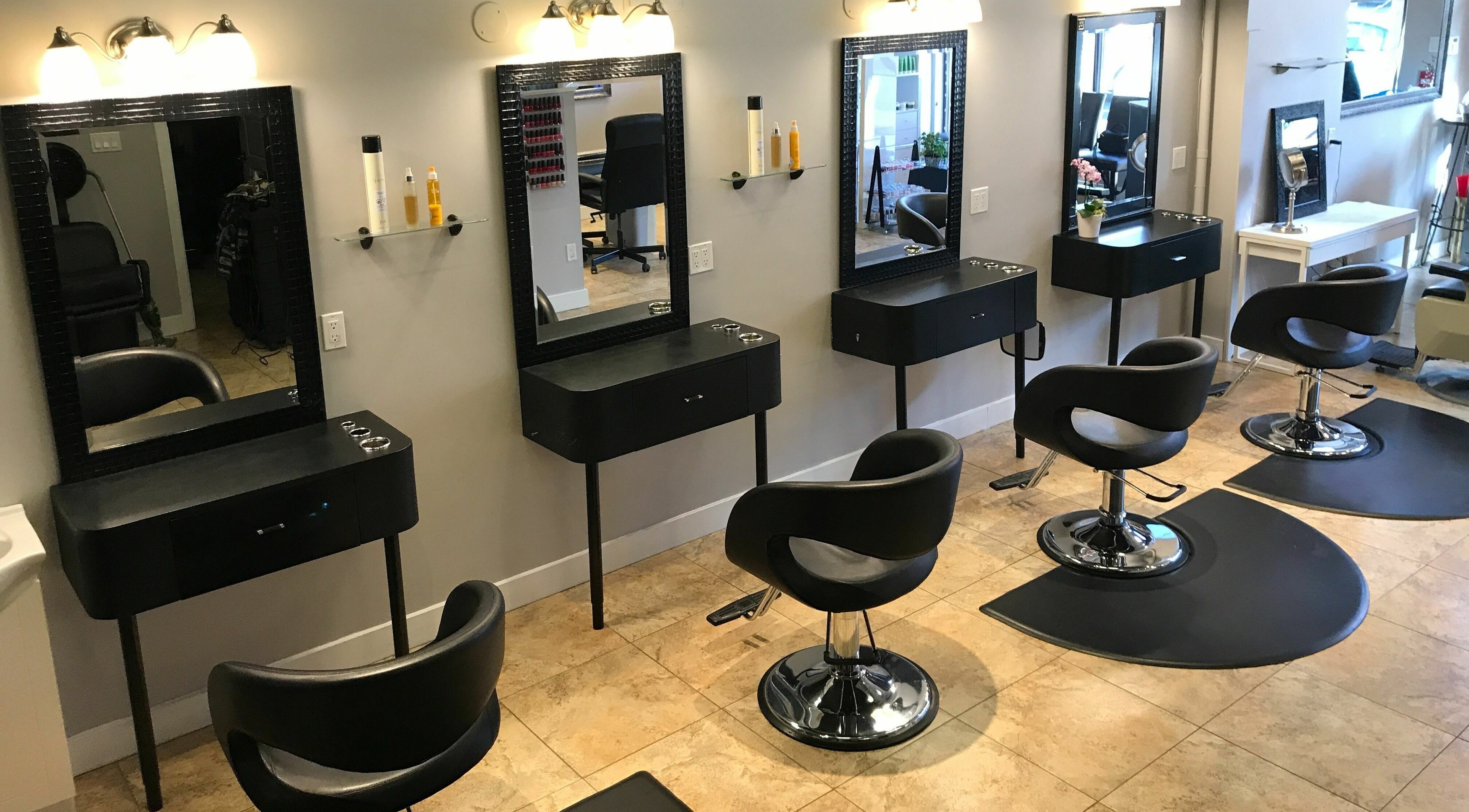 Interior of Boulevard Salon and Esthetics, Surrey, British Columbia, CA, featuring sleek styling stations.