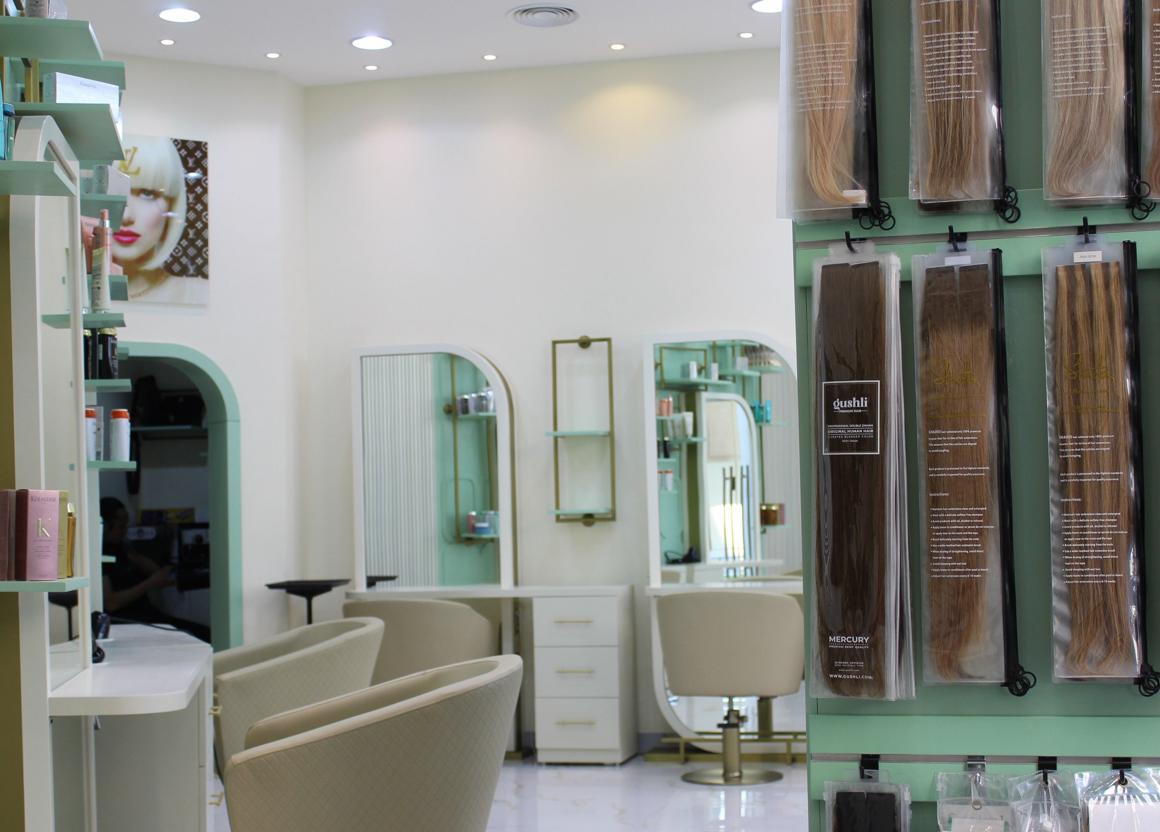 Blond Me Salon's chic interior showcasing hair products and stations, Dubai, AE.