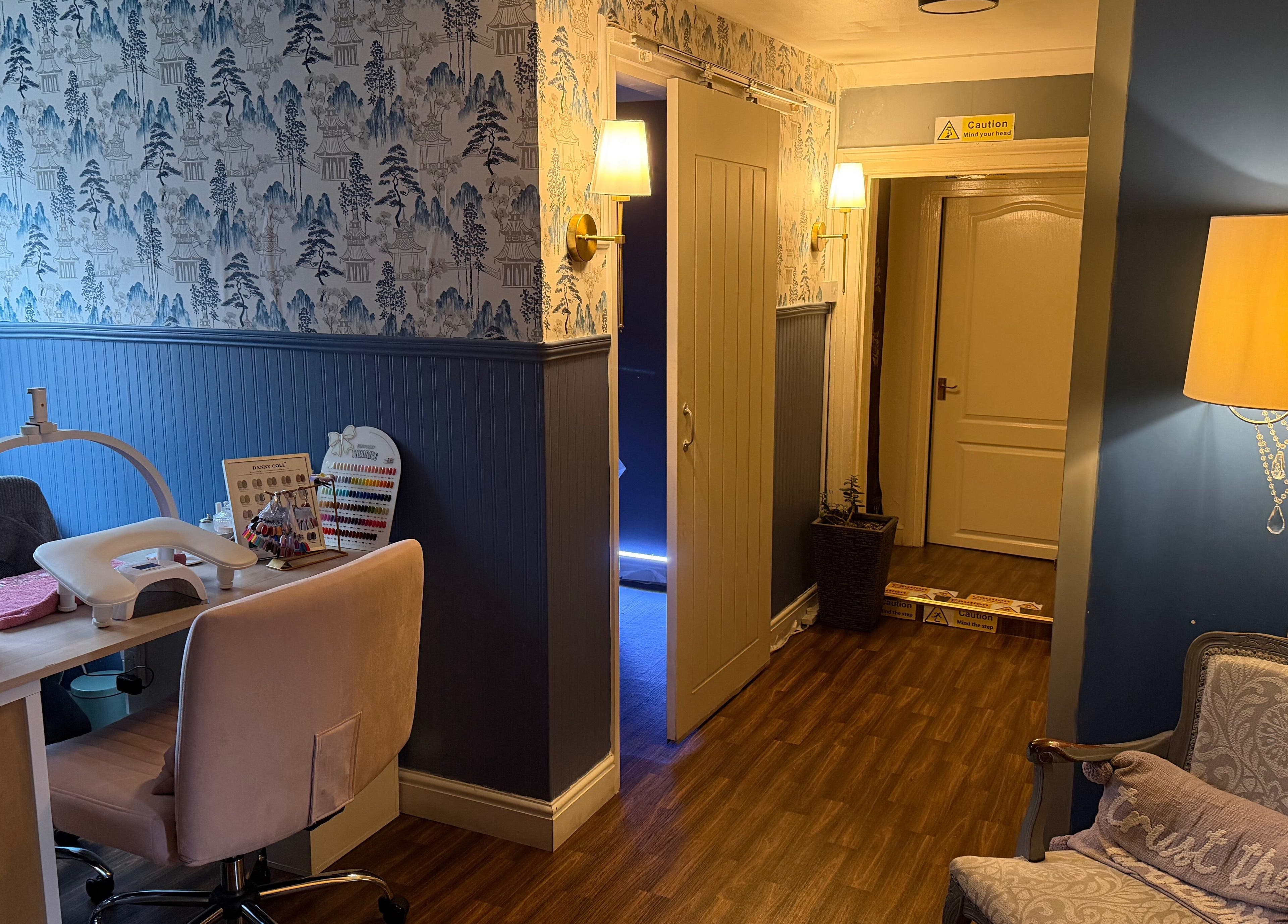 Nail station at Thai Spa & Clinic in March, England GB, featuring elegant decor and ambient lighting.