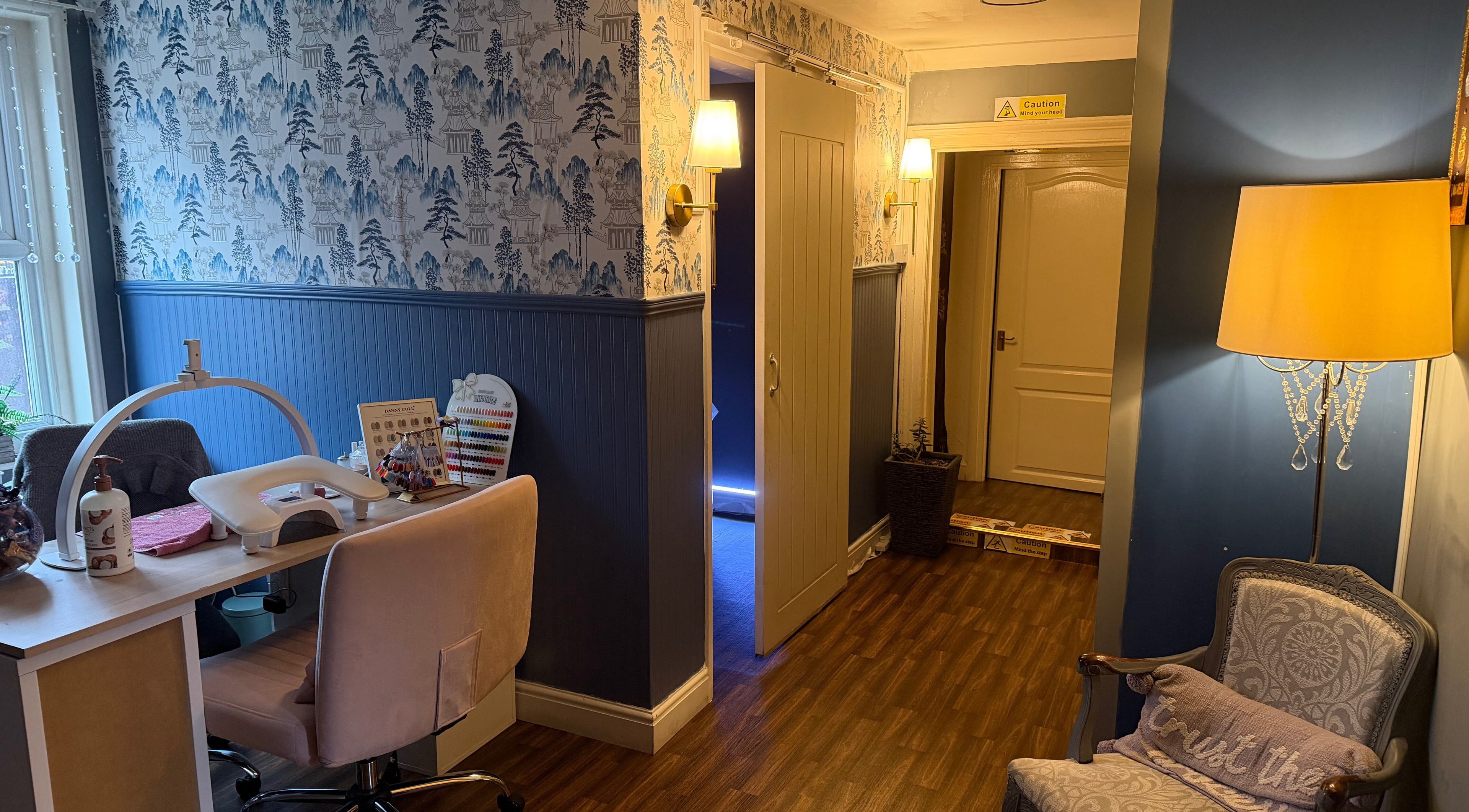 Nail station at Thai Spa & Clinic in March, England GB, featuring elegant decor and ambient lighting.