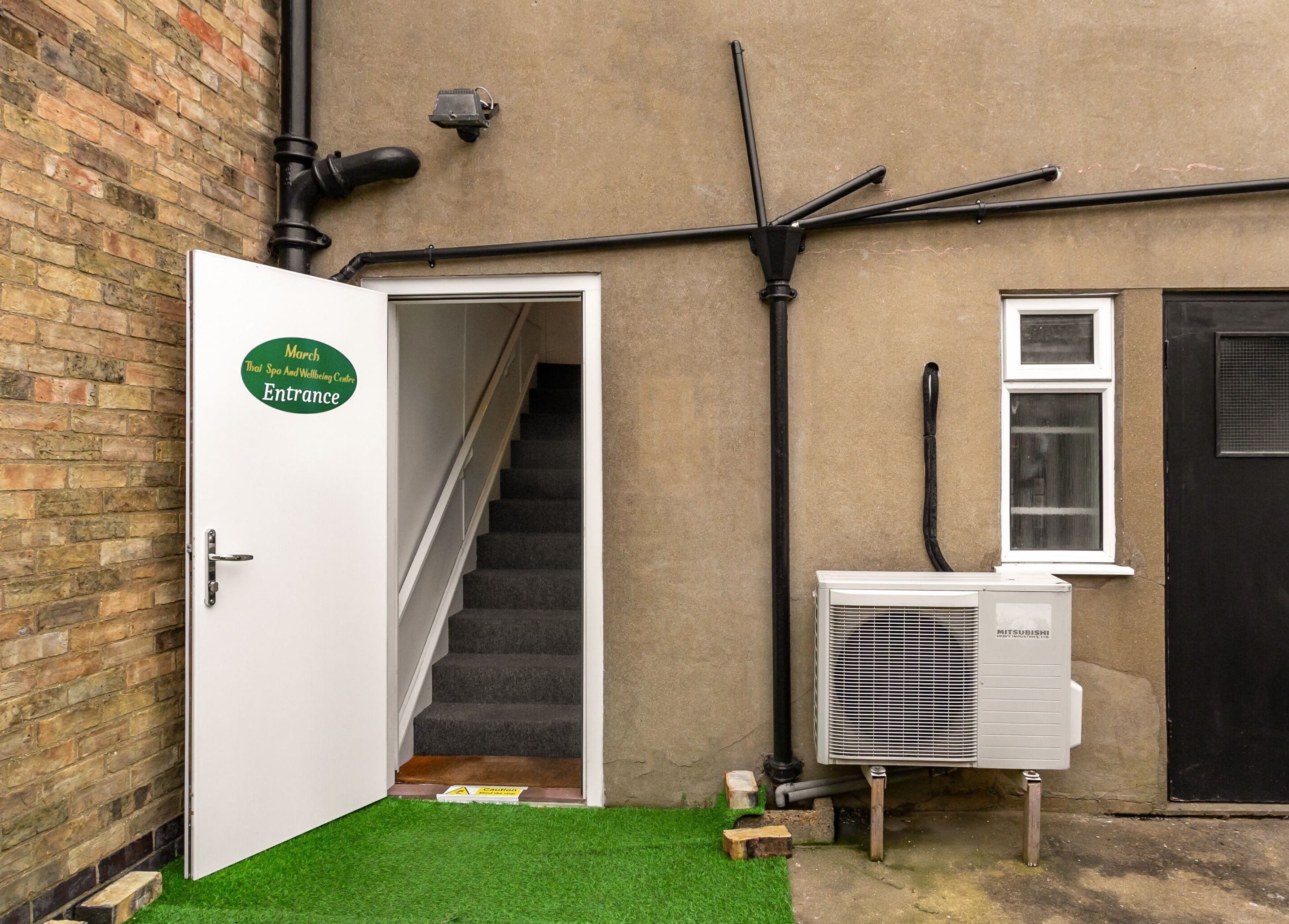 Entrance to Thai Spa & Clinic, March, England, GB featuring a welcoming open door.