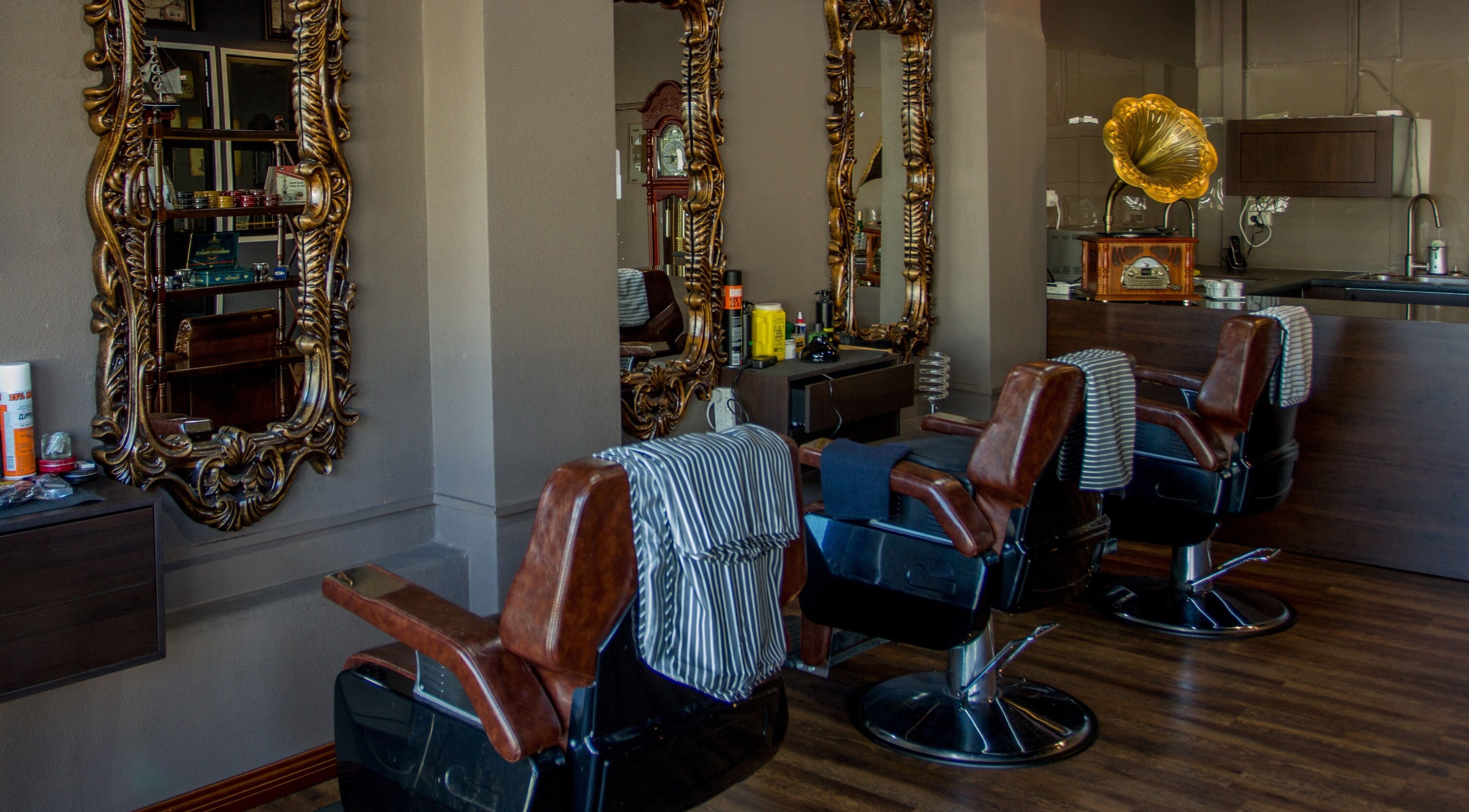 Elegant vintage barber chairs at Bespoke Barber in Perth, Western Australia, AU, showcasing classic style.