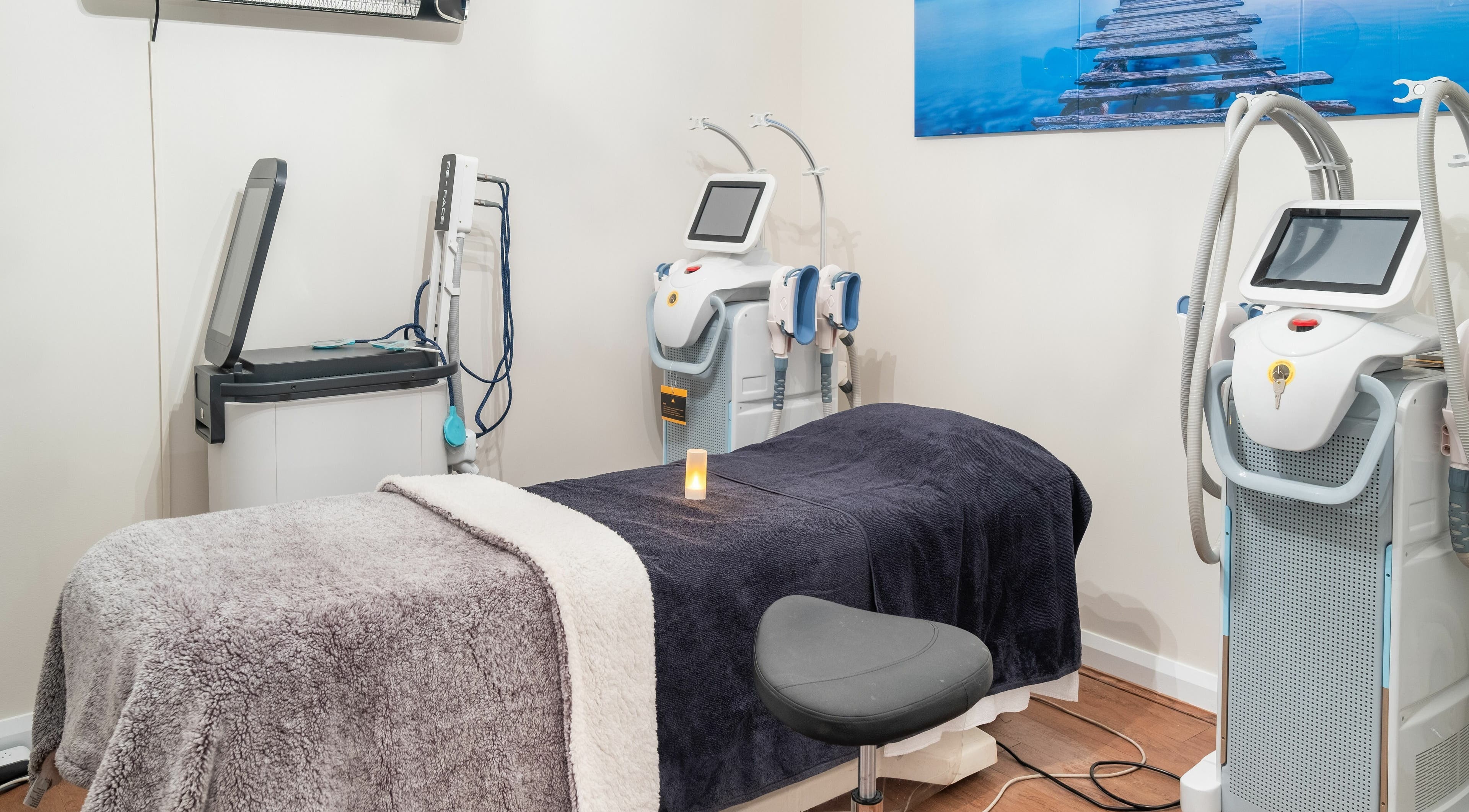 Tranquil treatment room at Ganesha Wellness Spa, Perth, Western Australia, AU with advanced therapy machines.