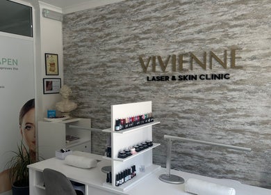 Vivienne Laser & Skin Clinic reception in Wied Il-għajn, MT showcasing modern design and skincare products.