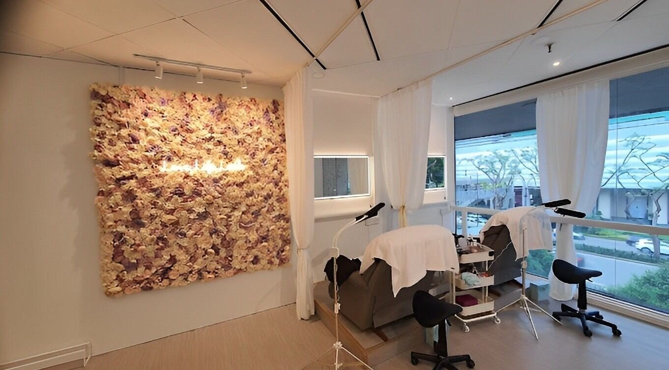 Luxurious interior of Ciao Lashes in Singapore, SG featuring chic decor and comfortable treatment spaces.