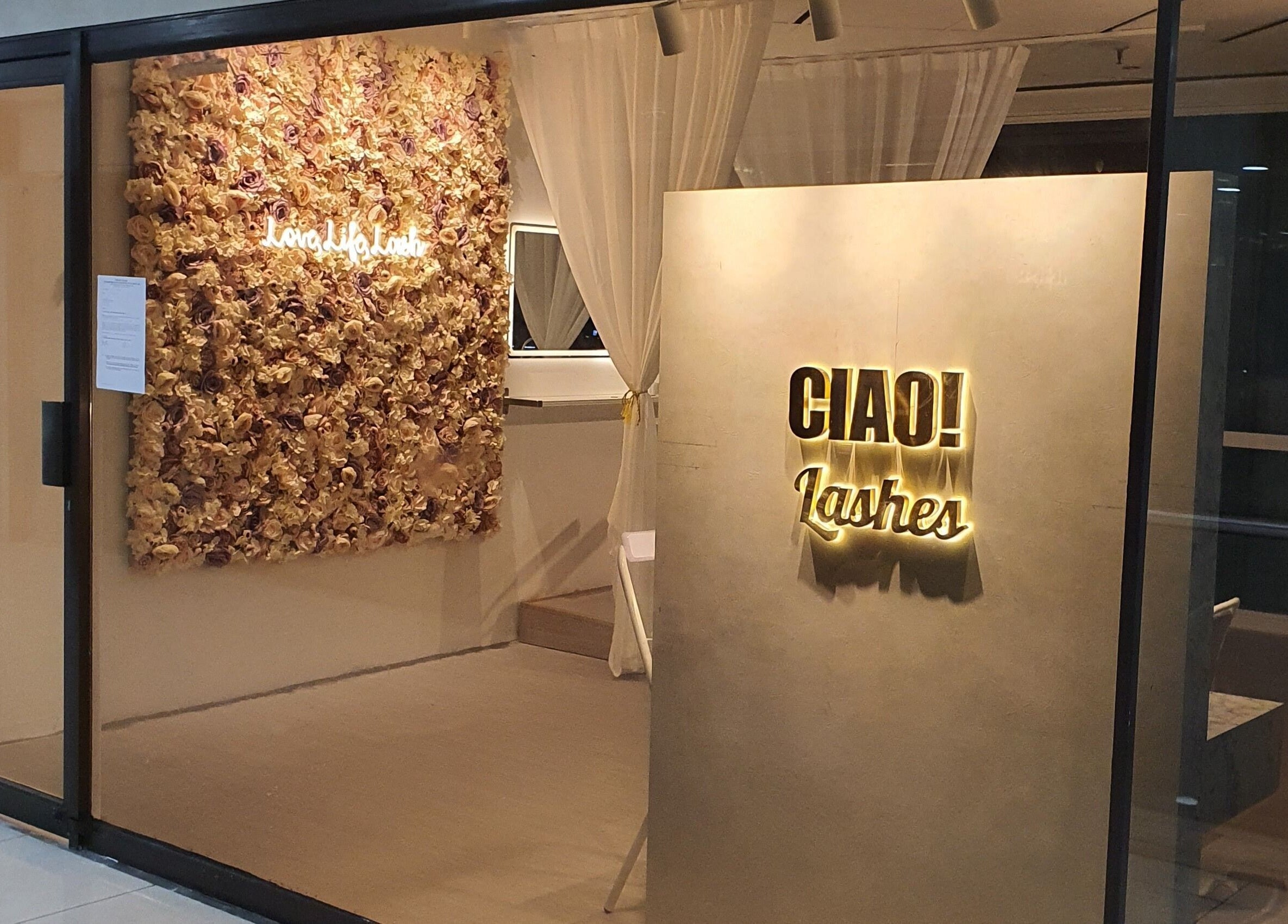 Ciao Lashes storefront with floral decor in Singapore, SG showcasing stylish beauty and wellness services.