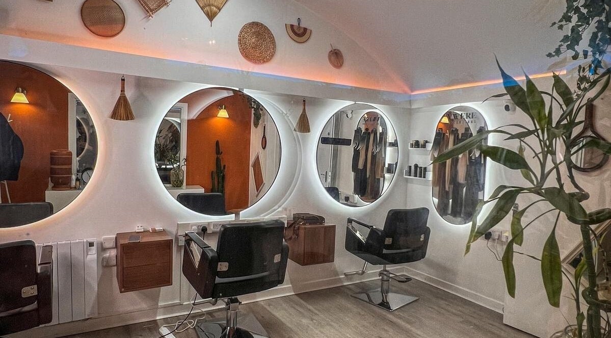 Elegant salon mirrors and chairs at Vivere Concept, Dublin 2, County Dublin, IE, showcasing modern beauty ambiance.