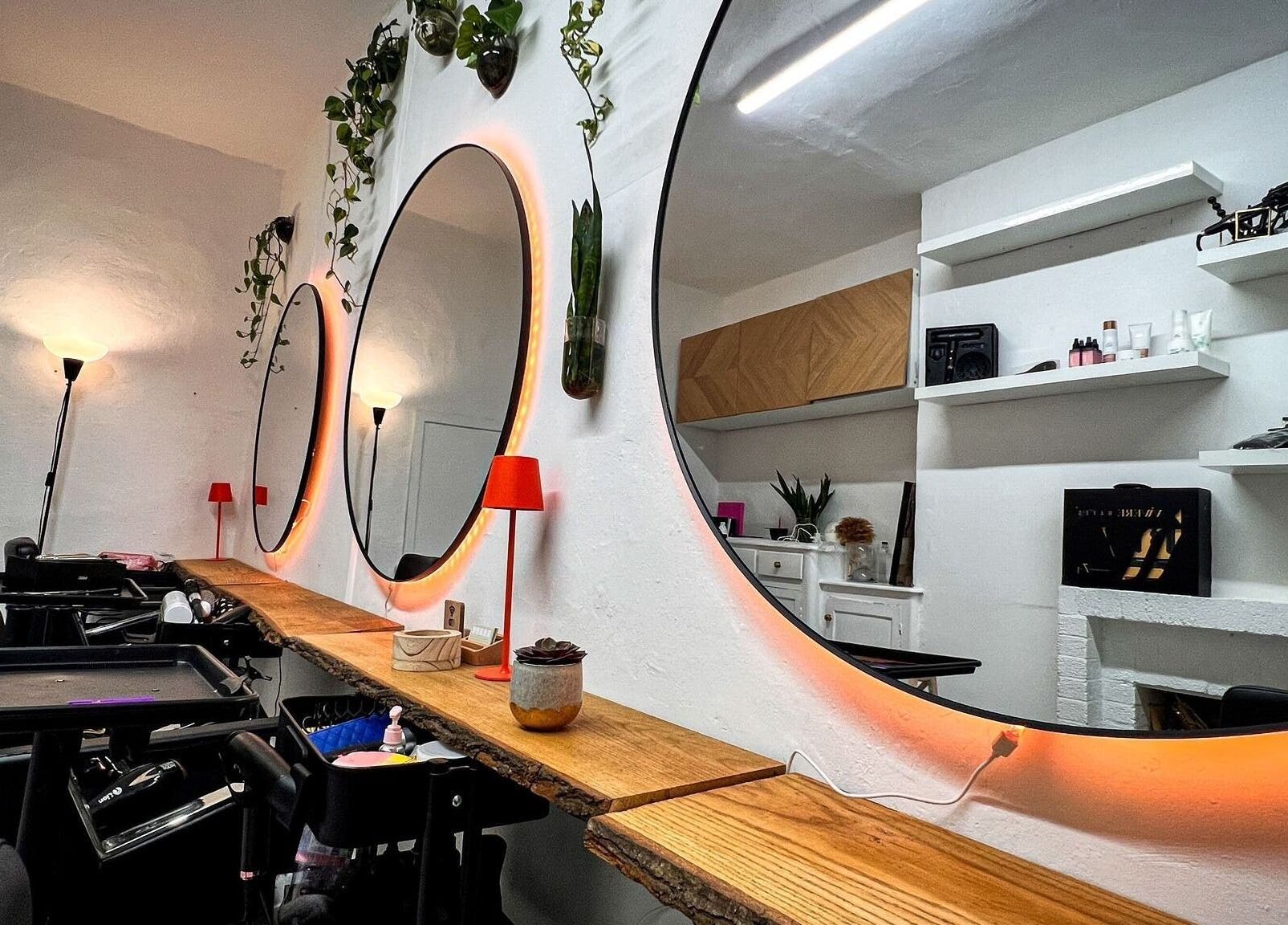 Modern salon setup with round mirrors at Vivere Concept, Dublin 2, County Dublin, IE.