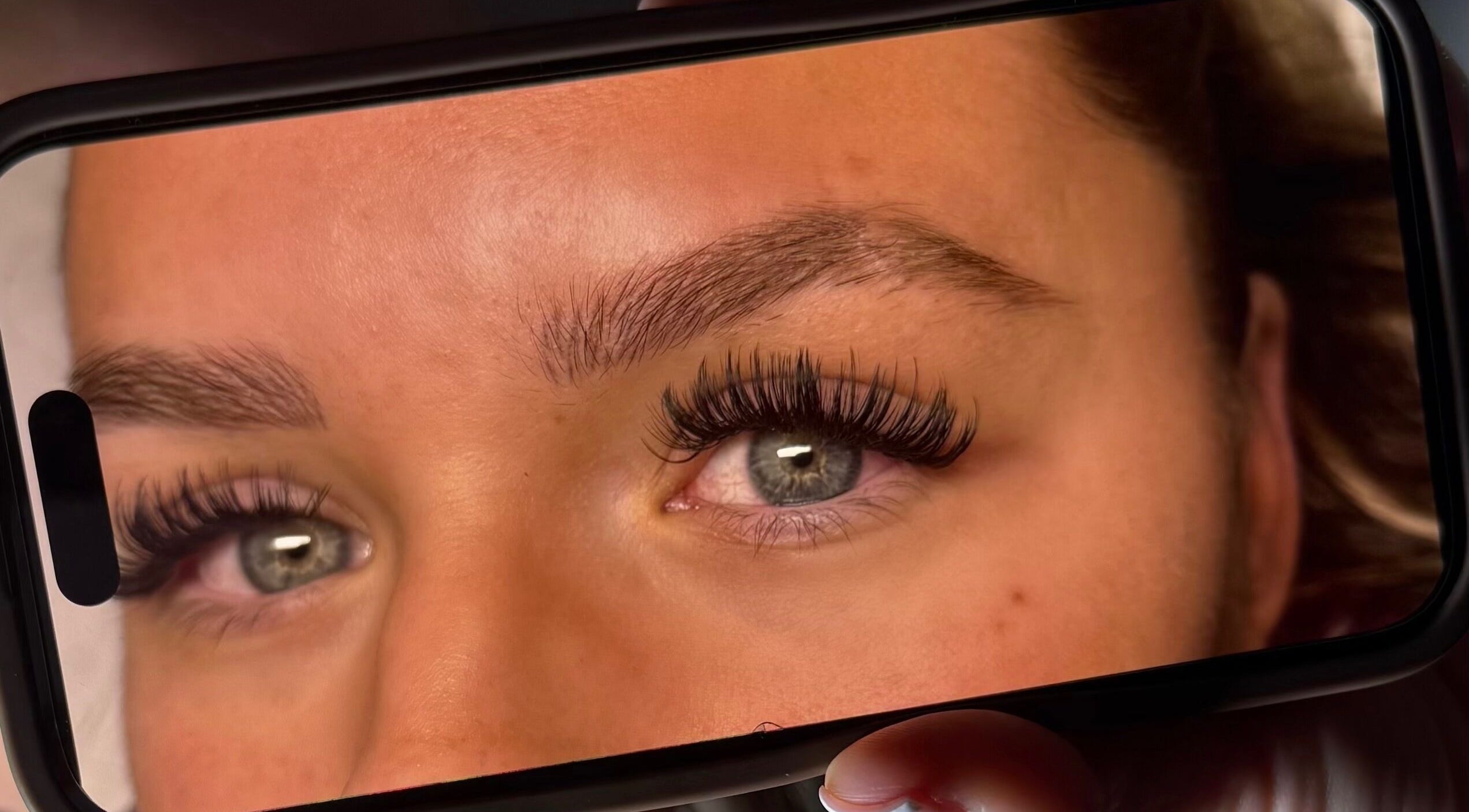Close-up of styled eyelashes at EyeLuxeLounge, Tuffley, England, GB. Stunning lash transformation.