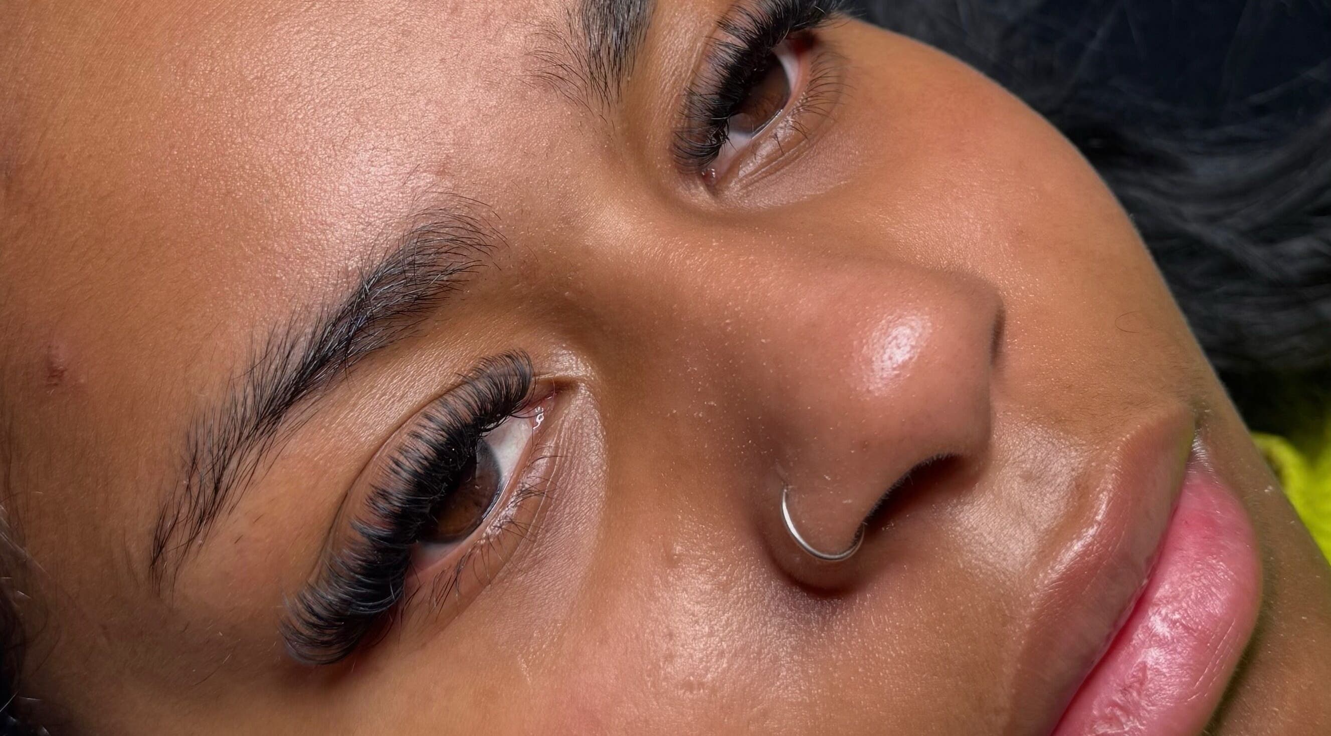 Close-up of exquisite eyelash extensions at EyeLuxeLounge, Tuffley, England, GB, highlighting detailed craftsmanship.
