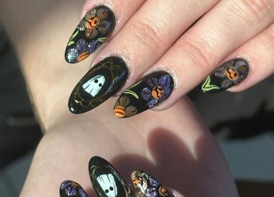 Stylish Halloween-themed nail art at Nail House and Spa in Hollywood, Florida, US.