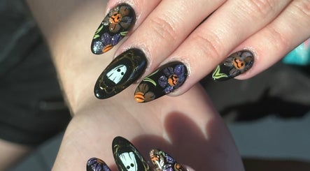 Stylish Halloween-themed nail art at Nail House and Spa in Hollywood, Florida, US.