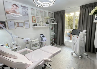 Elegantly designed treatment room at Roza Health & Beauty, London, England, GB, showcasing modern wellness equipment.