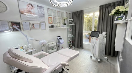 Elegantly designed treatment room at Roza Health & Beauty, London, England, GB, showcasing modern wellness equipment.