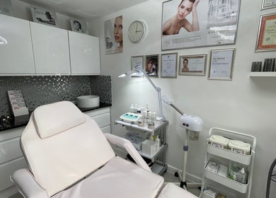 Modern treatment room at Roza Health & Beauty, London, England, GB featuring stylish decor and state-of-the-art equipment.