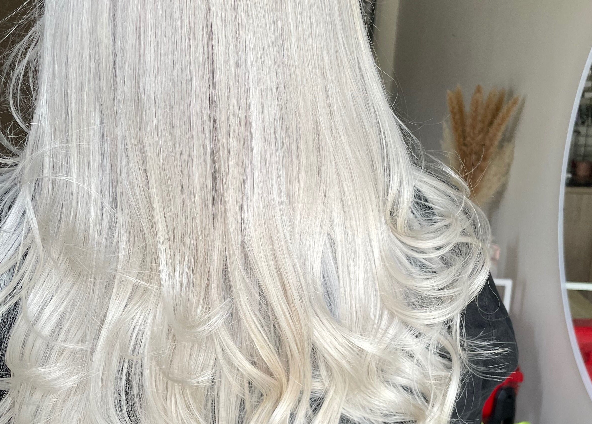 Stunning silver hair styling at CHEVEU, Jimboomba, Queensland, AU. Sleek and sophisticated look.