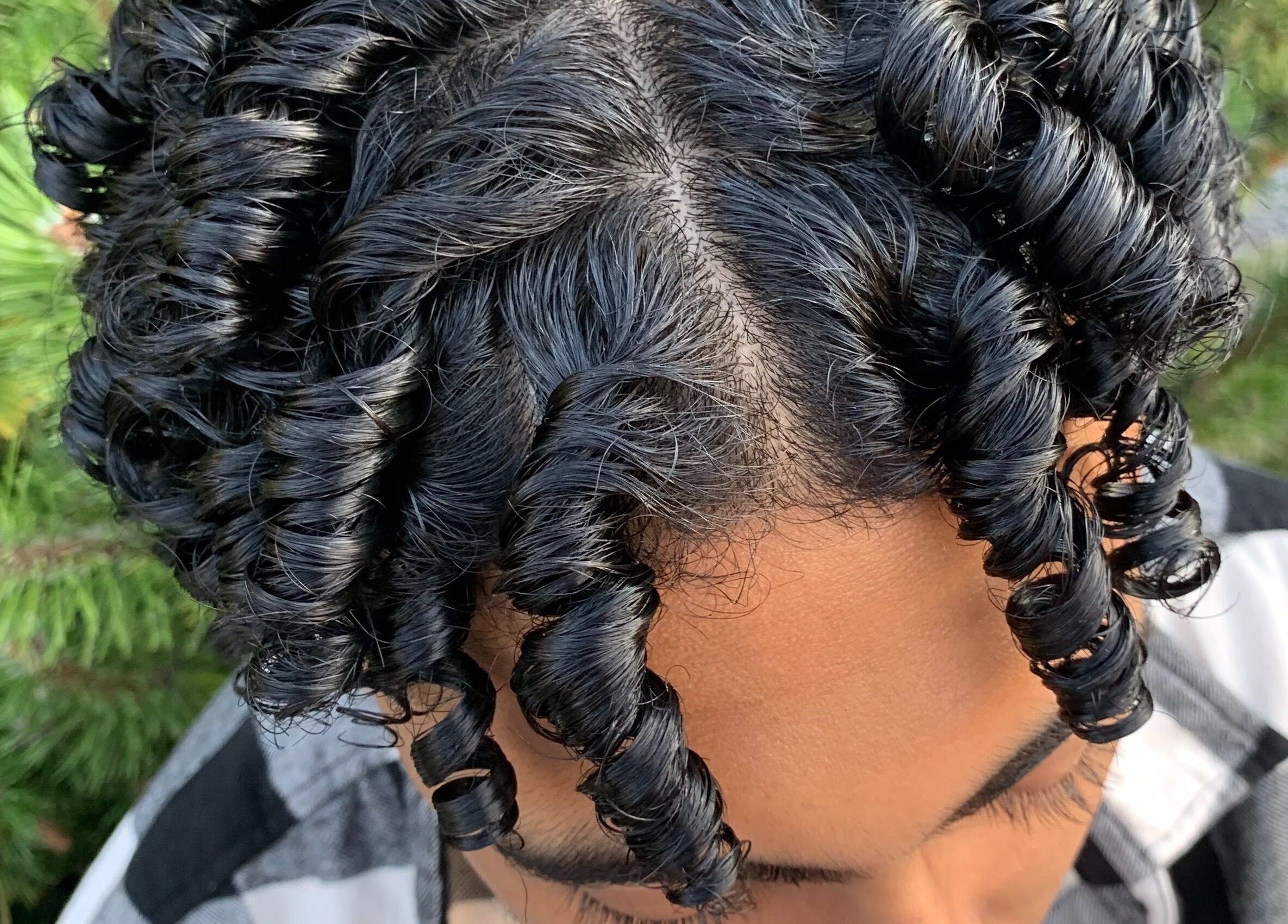 Elegant curls styled at Zayythebarber in Surrey, British Columbia, CA, showcasing expert haircare.