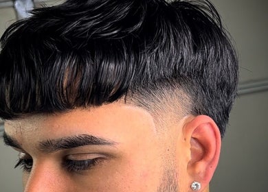 Close-up of a sleek taper fade haircut by Zayythebarber in Surrey, British Columbia, CA.