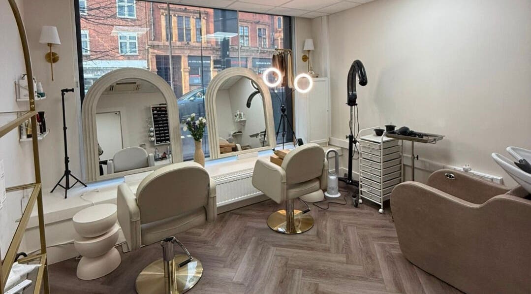 Interior of Blonde Studio London in London, England, GB with elegant mirrors and chic salon chairs.