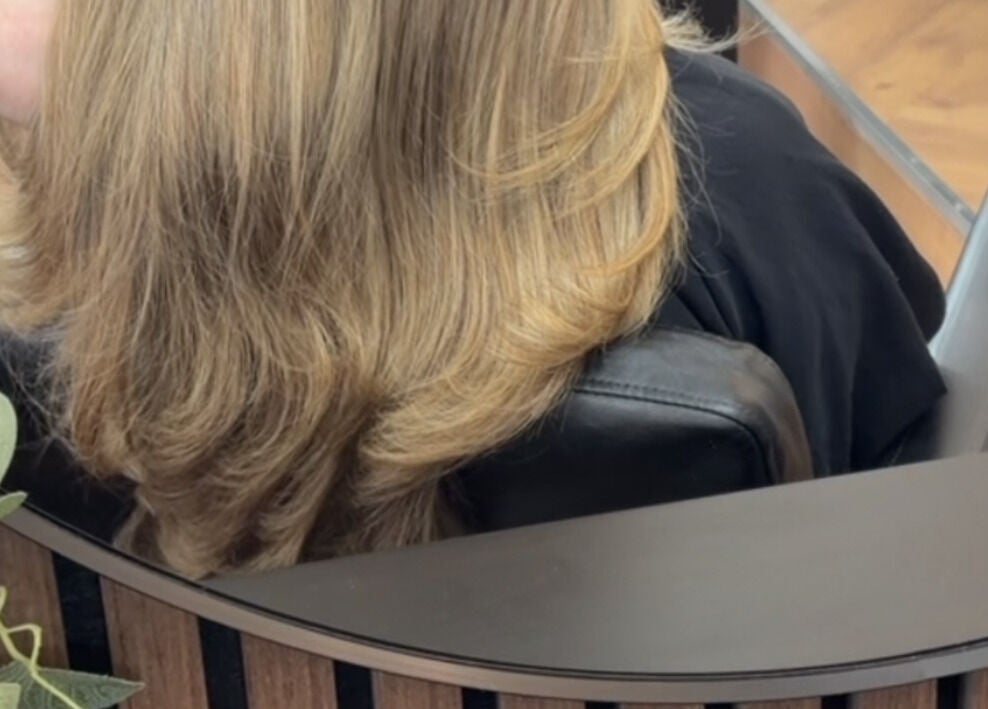 Close-up of styled blonde layers at Hair By Shannyn, Salon Biba, Larbert, Scotland, GB.