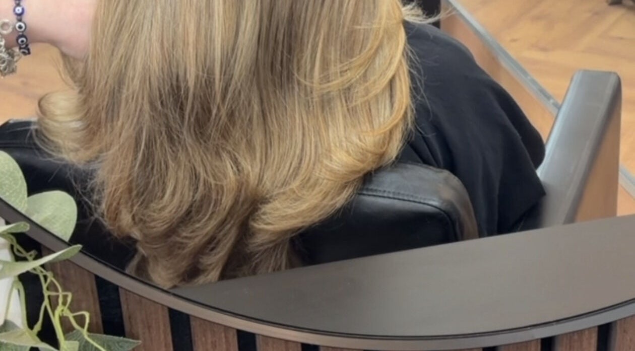 Close-up of styled blonde layers at Hair By Shannyn, Salon Biba, Larbert, Scotland, GB.