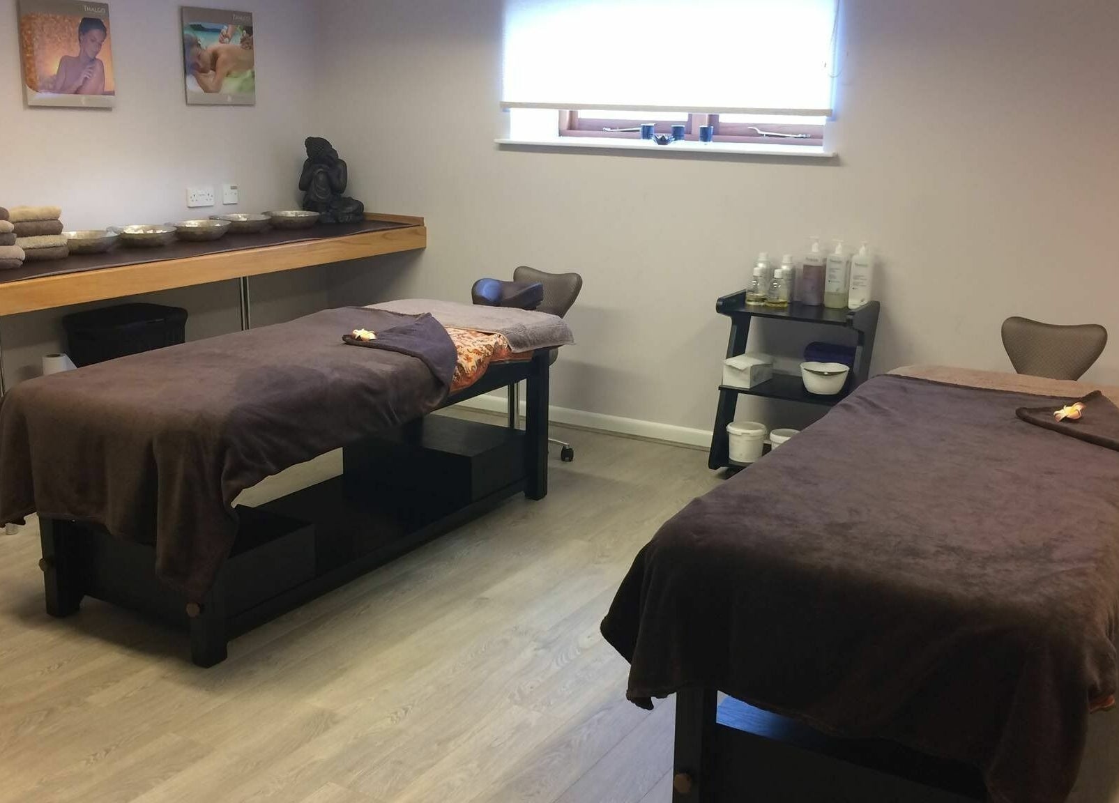 Luxurious massage room at Lotus Spa and Academy Centre, Abbotskerswell, England, GB with two massage tables.