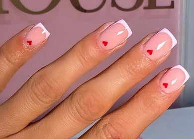 Elegant manicure with heart design at The Doll House York, York, England, GB.
