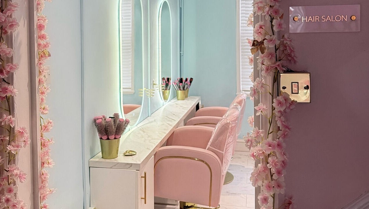 Elegant pink-themed hair salon at The Doll House York, located in York, England, GB.