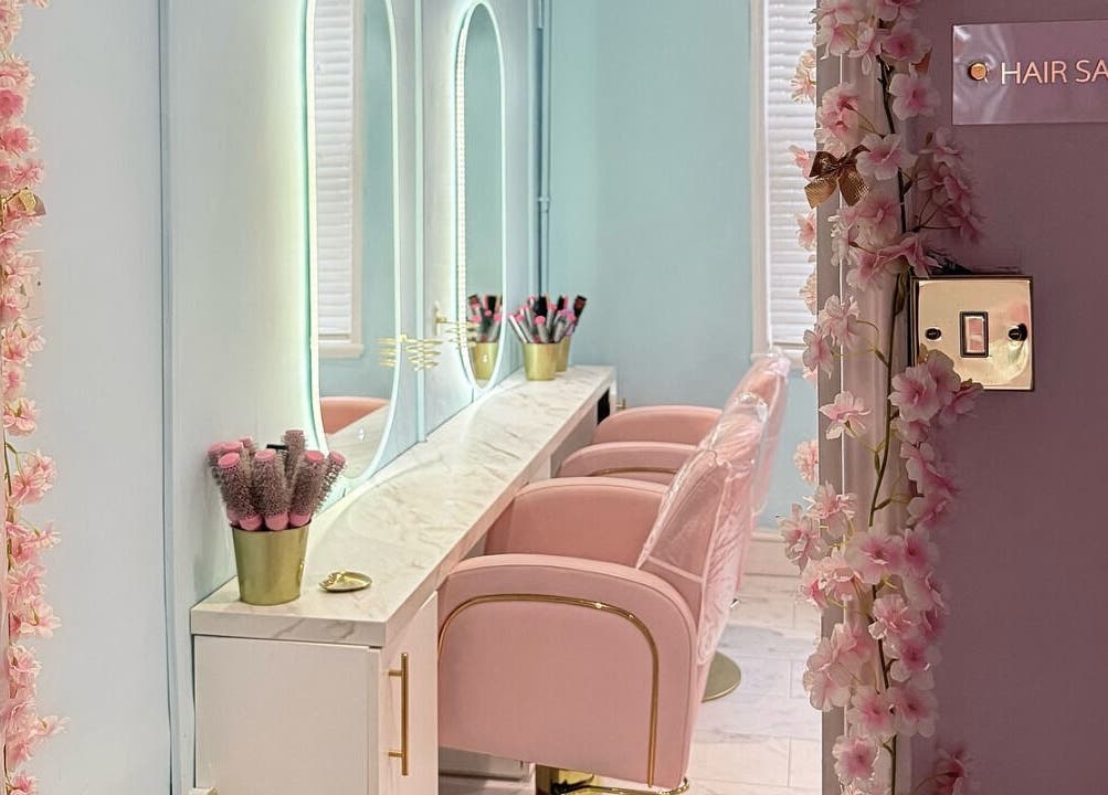 Elegant pink-themed hair salon at The Doll House York, located in York, England, GB.