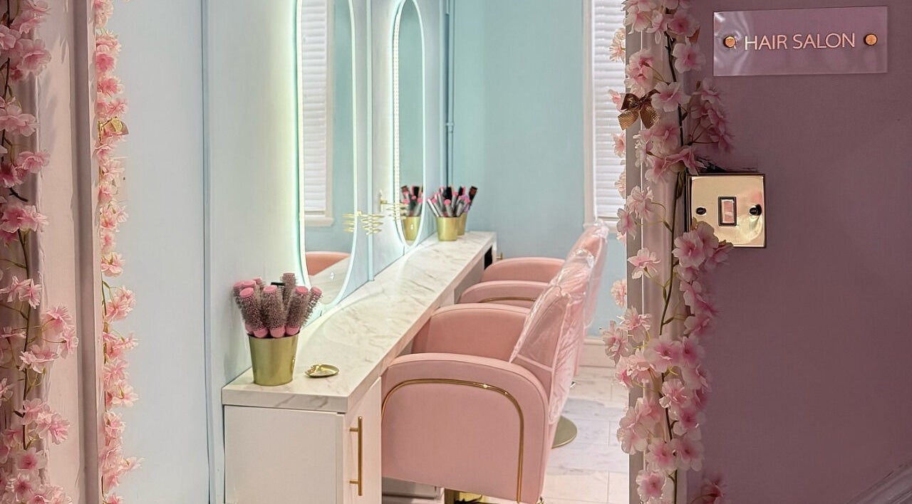 Elegant pink-themed hair salon at The Doll House York, located in York, England, GB.