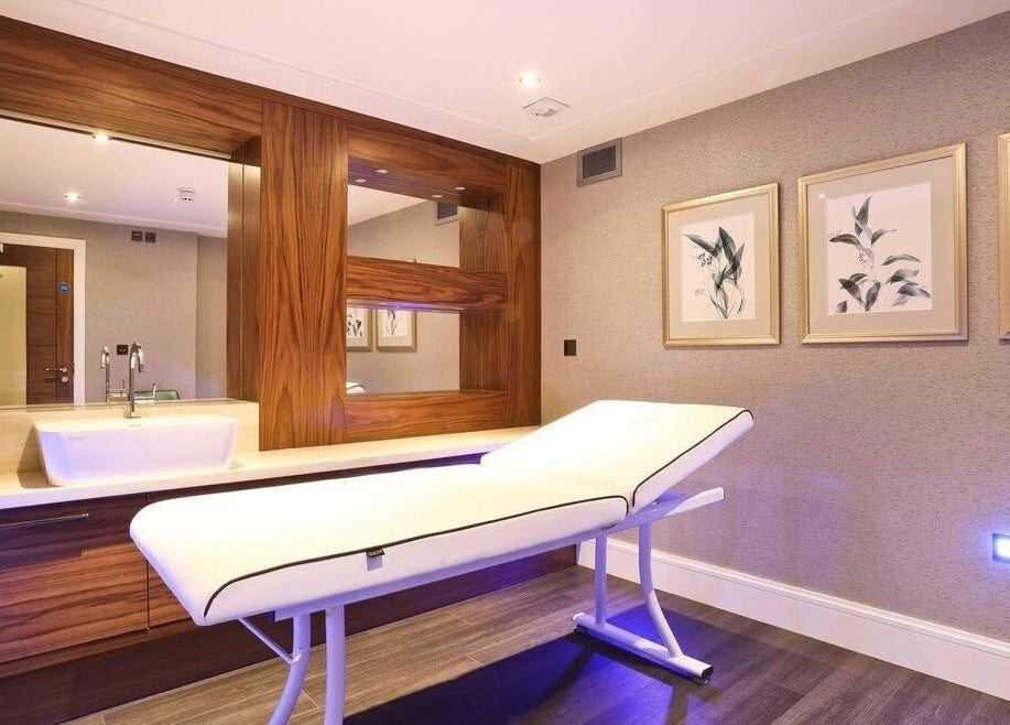 Relaxing treatment room at Jasia Holistic@ The Vale Living, London, GB with a spa bed and soothing decor.