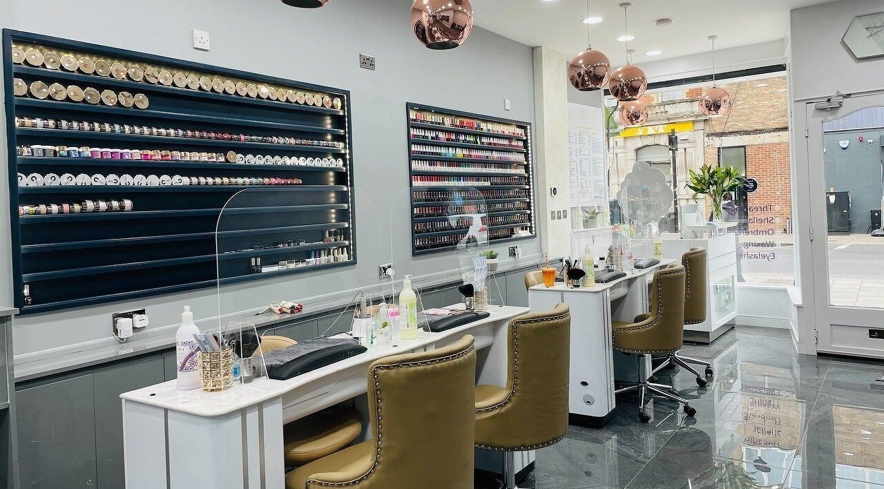 Elegant interior of Lyttle Minx Nails & Beauty in London, England, GB showcasing modern nail bar setup.