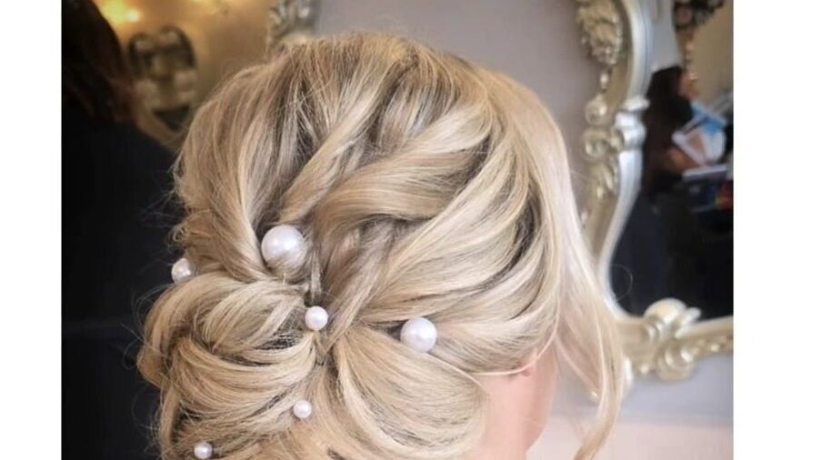 Elegant updo with pearls at Jenna Mcdonnell, Newport, Wales, GB.