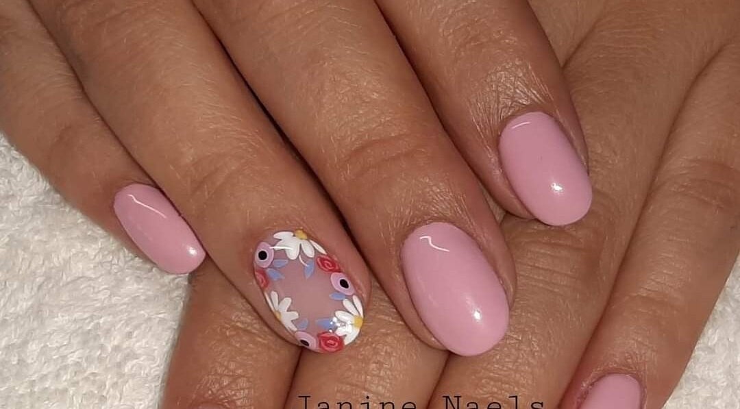 Pink nails with floral design at Janine Minnaar, Bothaville, Free State, ZA.