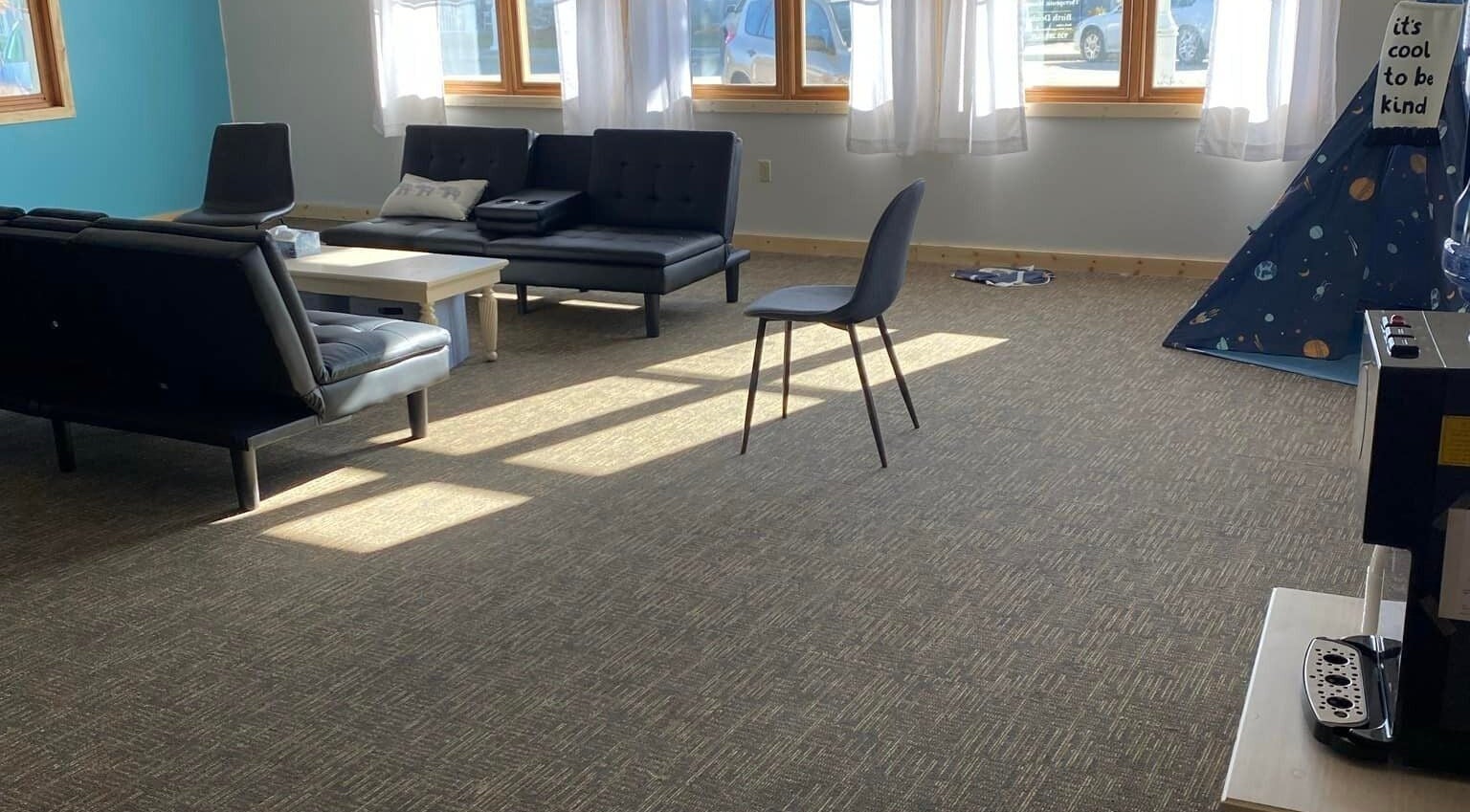 Inviting lounge area with comfy seating at Sheboygan Wellness Studio, Sheboygan, Wisconsin, US.