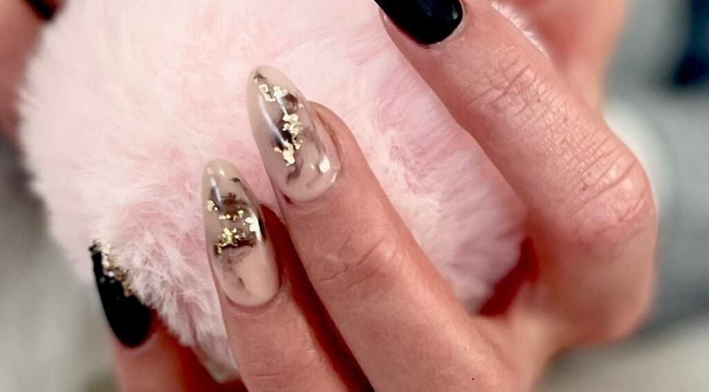 Elegant manicure with gold accents at Nails In Grace, Benoni, Gauteng, ZA.