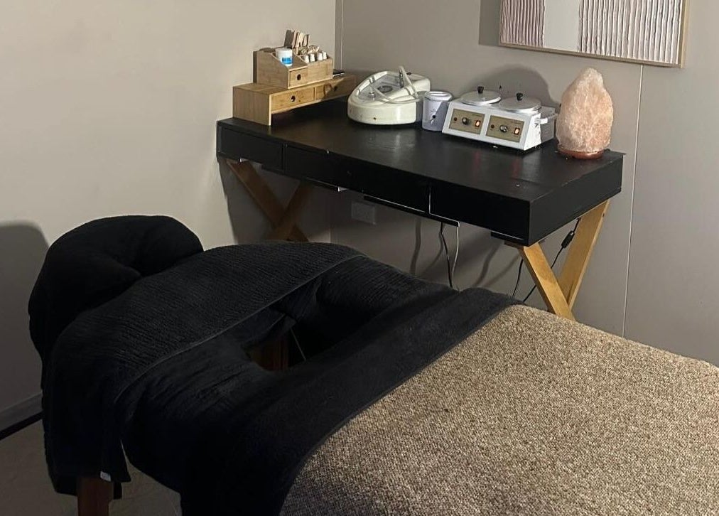 Relaxing massage room at The Littlest Beauty Studio, Auckland, NZ. Cozy setup enhances wellness experience.
