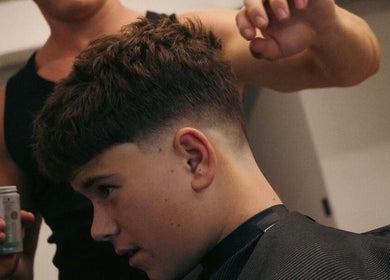 Stylish haircut at Studio 61 Barbershop, Long Jetty, New South Wales, AU, showcasing expert barber skills.
